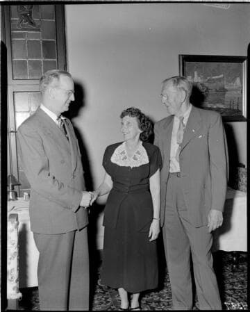 Two men and a woman
